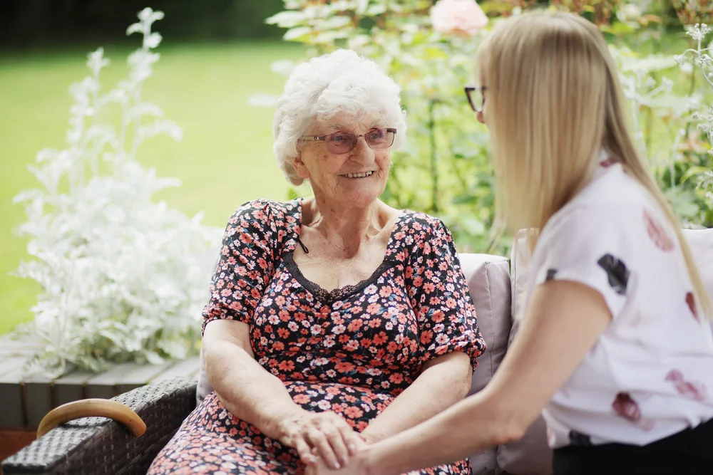 Care Home Resident and Team Member interacting at Pelsall Hall in Walsall