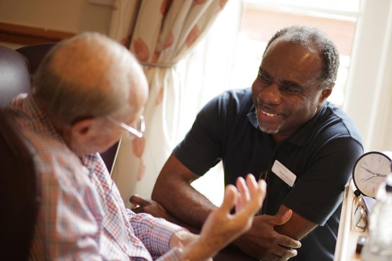 Greensleeves Staff interacting with a care home resident